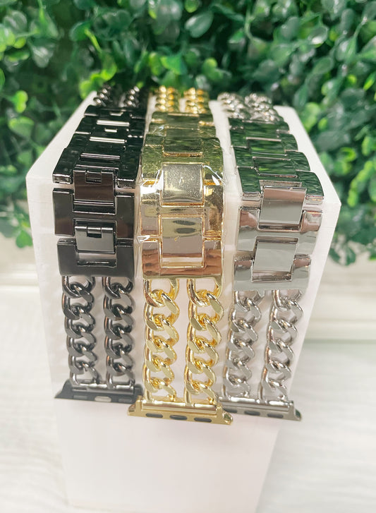 Black, gold, and silver chain link apple watch bands