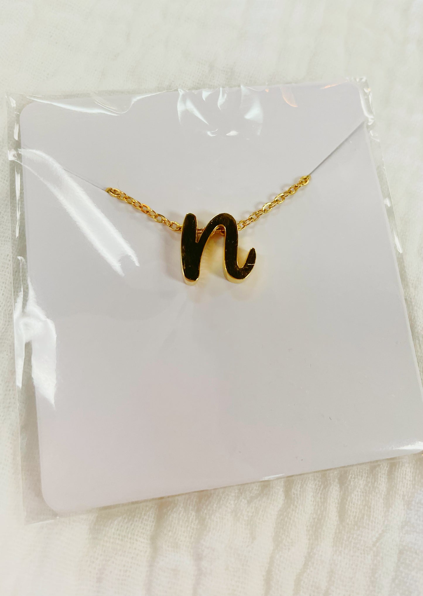 Letter n tiny initial gold necklace