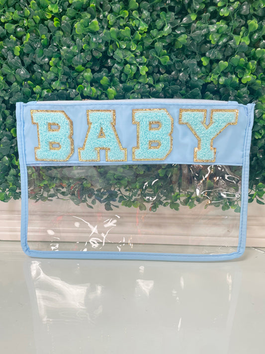 Clear zippered pouch that has a light blue border with the word 'baby' embroidered at the top in chenille light blue varsity letters outlined in shiny gold.