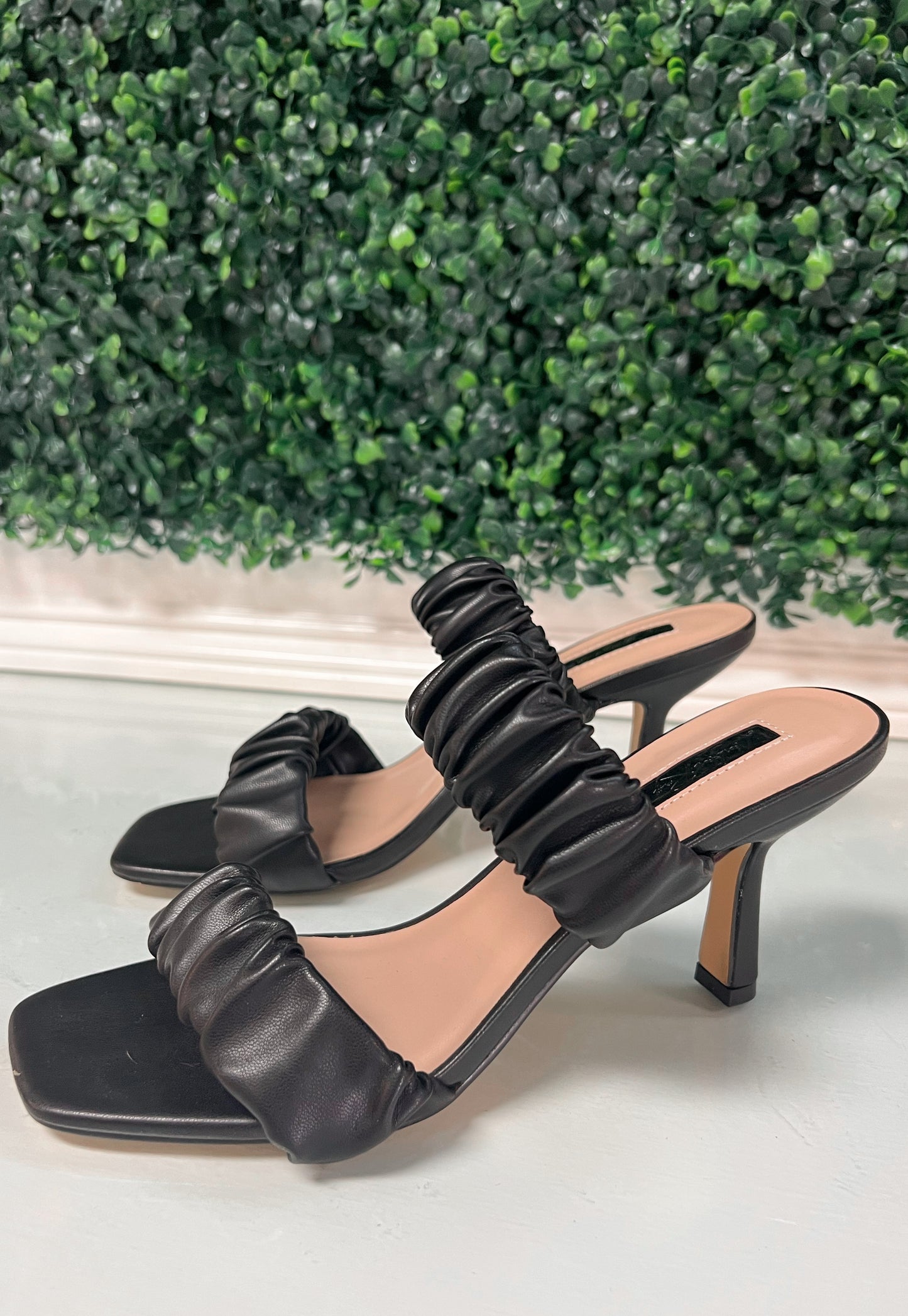 Black faux leather heels with ruffled thick straps