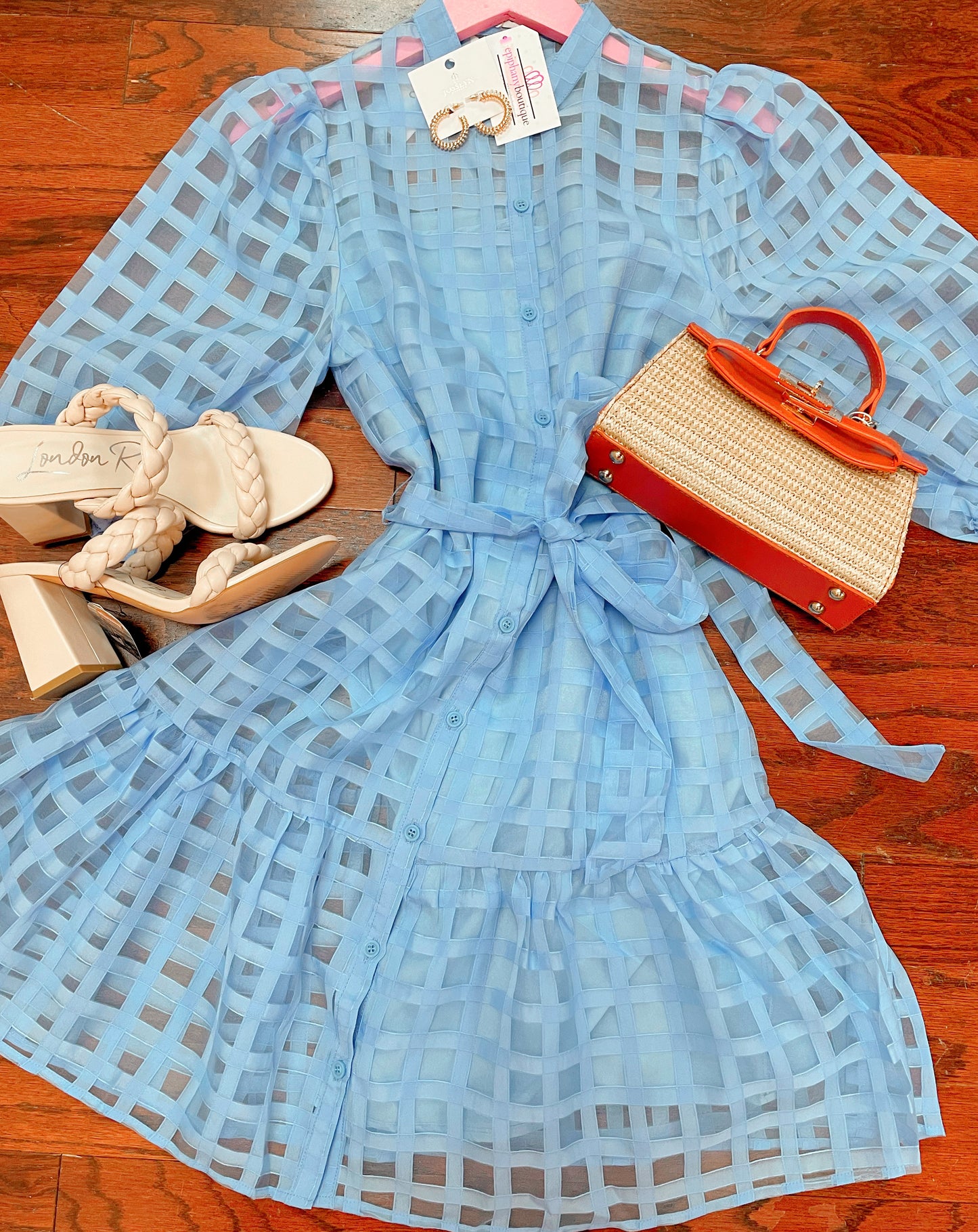 Off white slip-on block heel with 2 braided straps paired with blue dress and woven purse