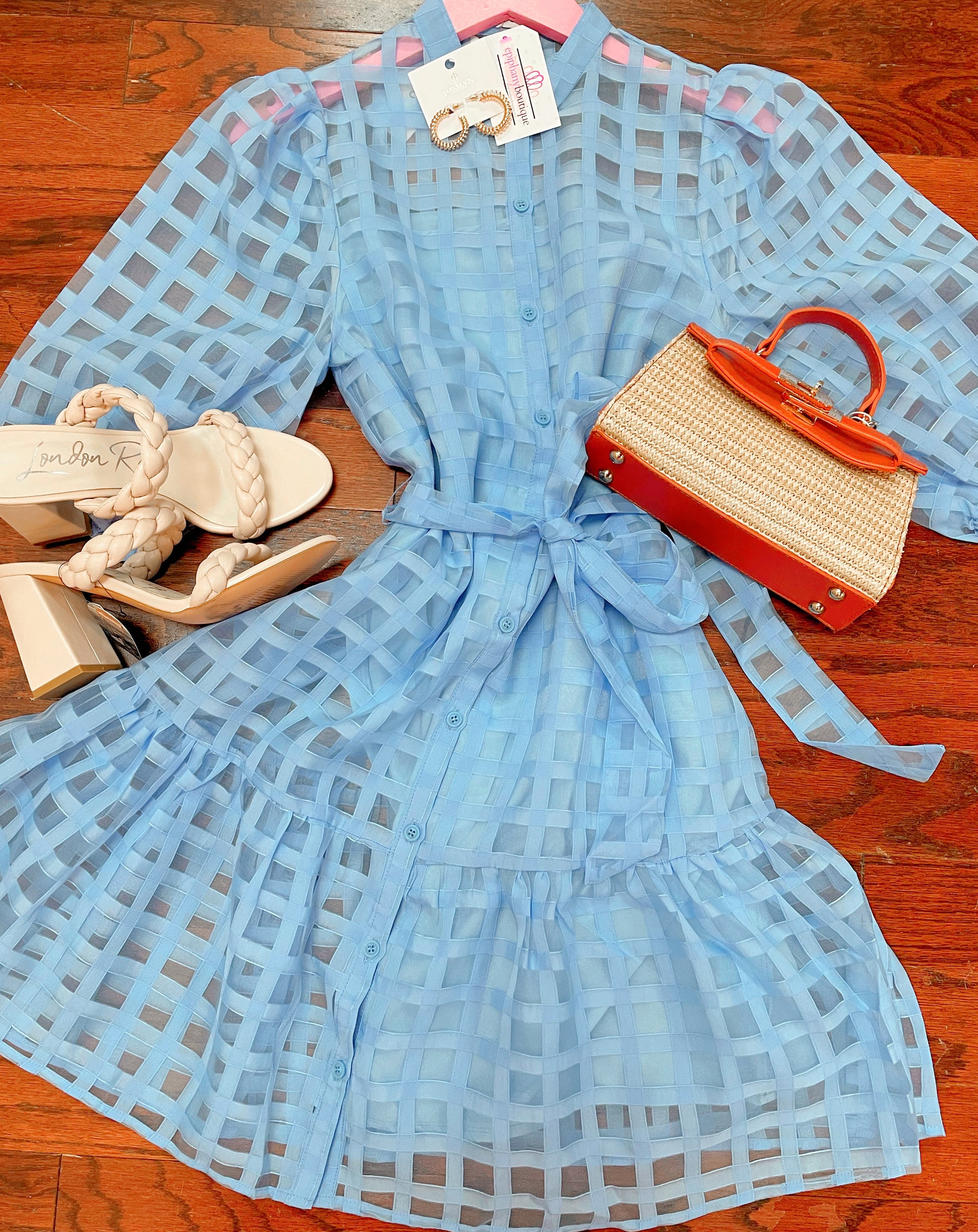 Off white slip-on block heel with 2 braided straps paired with blue dress and woven purse