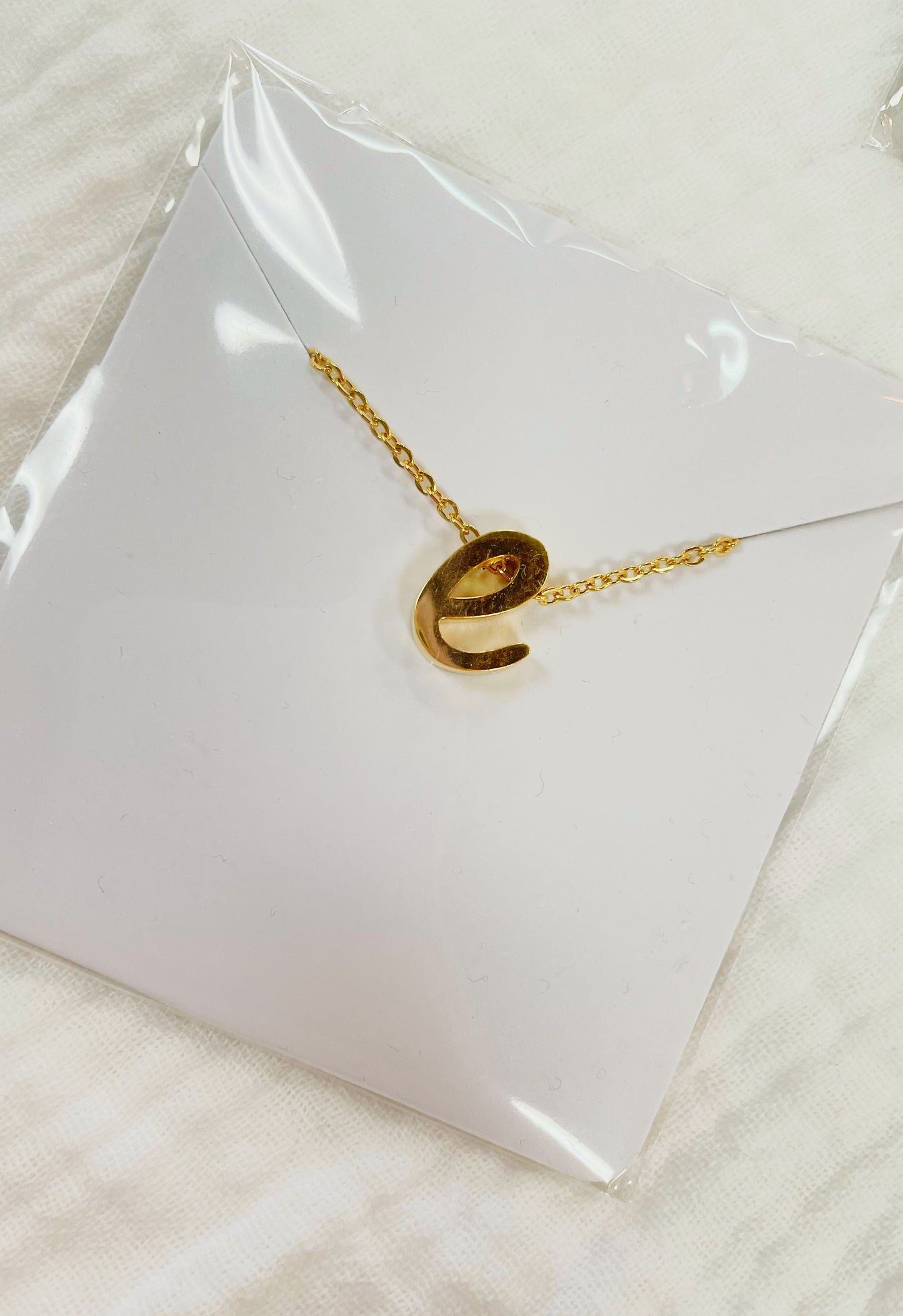 Letter e tiny initial gold necklace