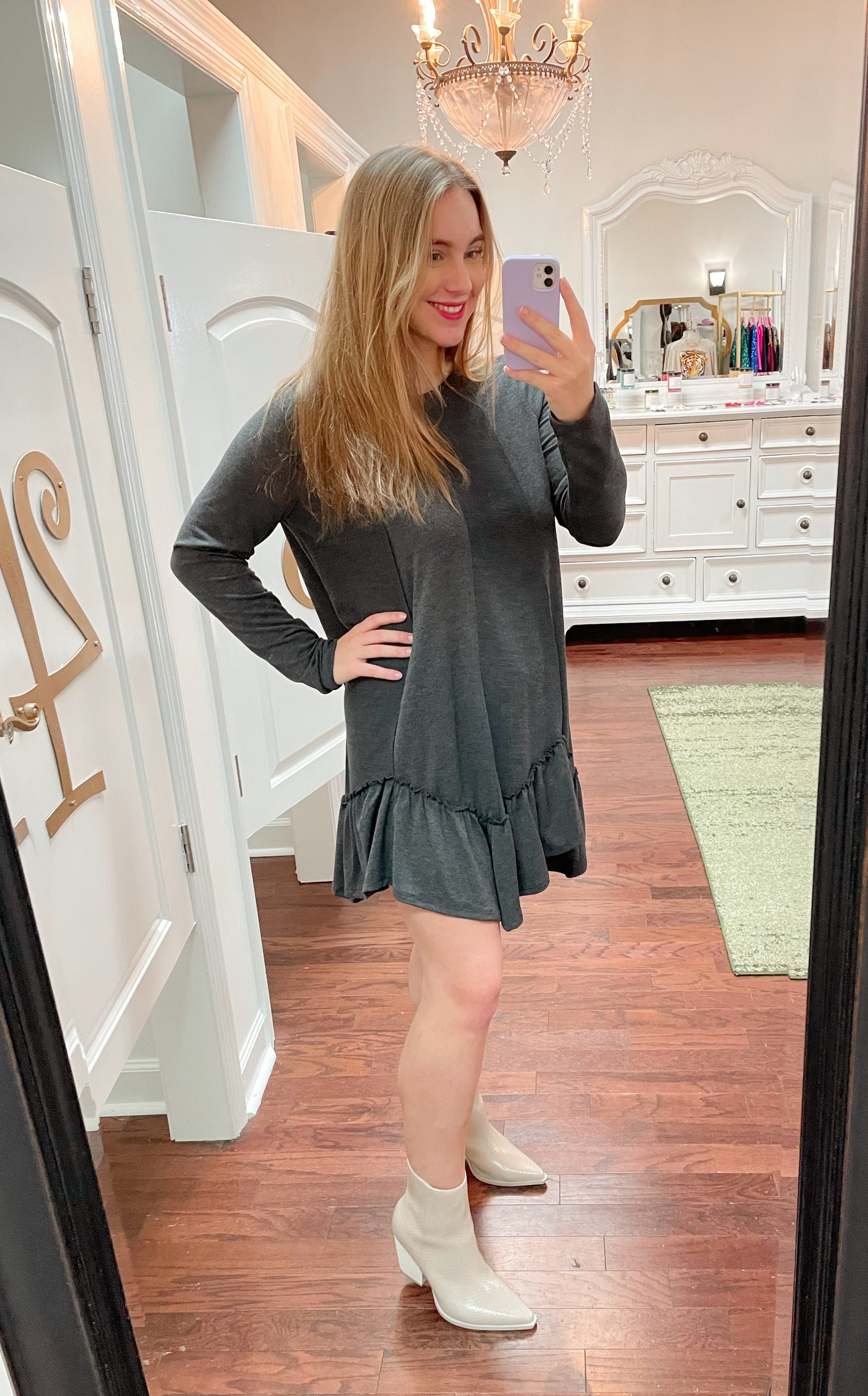 Beige faux snake skin heeled ankle booties paired with dark grey long sleeve dress